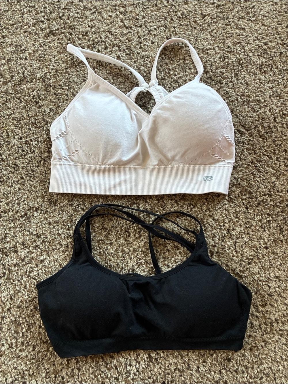 Two black and white bralettes racer back